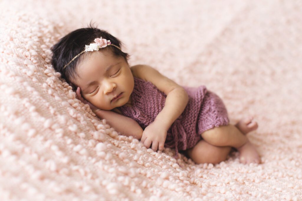 why do babies grab your face while going to sleep