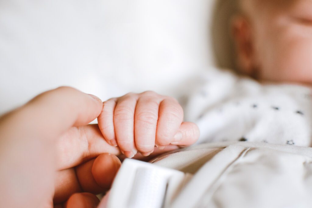 baby spit up through nose while sleeping