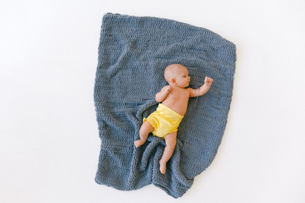 is it okay for baby to sleep in diaper only