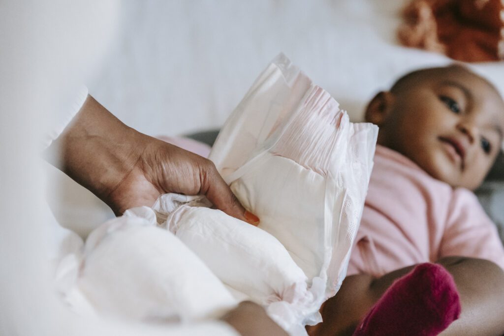 should i change a poopy diaper if baby is sleeping