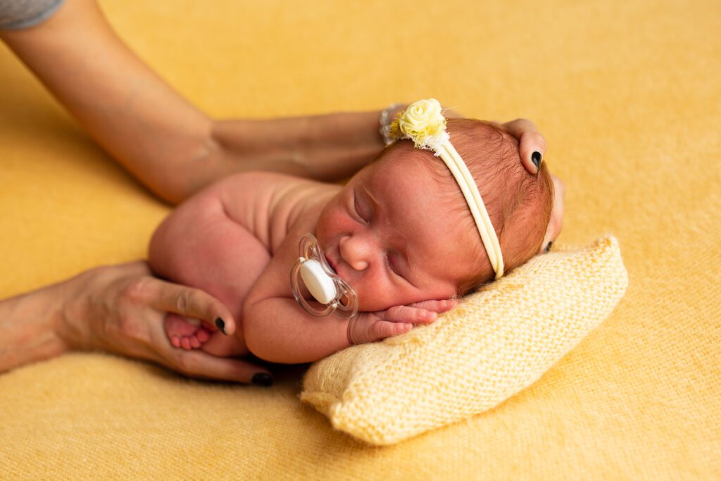 can a baby sleep with a pacifier all night