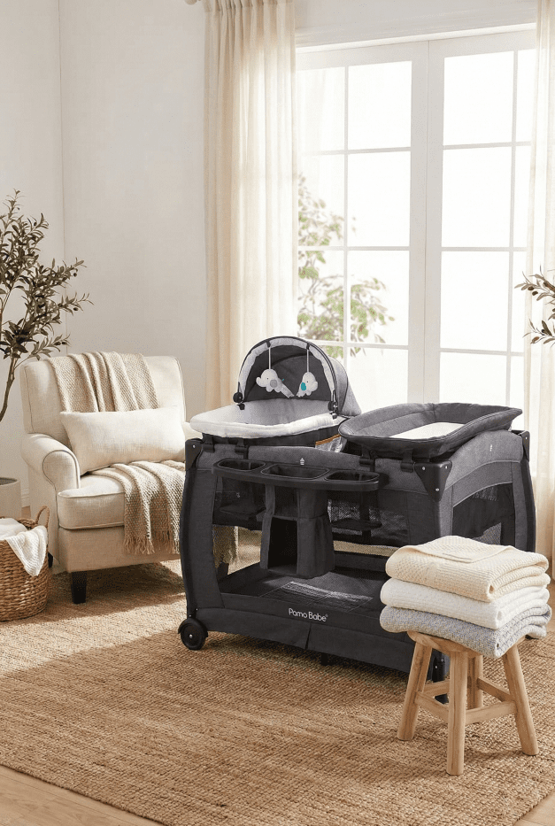 A Pack 'n Play featuring a bassinet insert for newborn sleeping.
